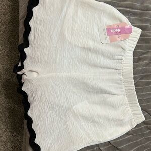 White Shorts with Black Trim